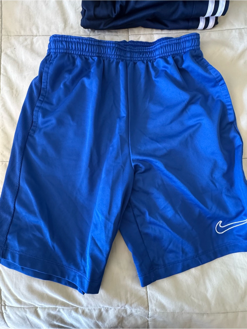 Nike Royal Blue Kids Athletic Shorts with White Swoosh